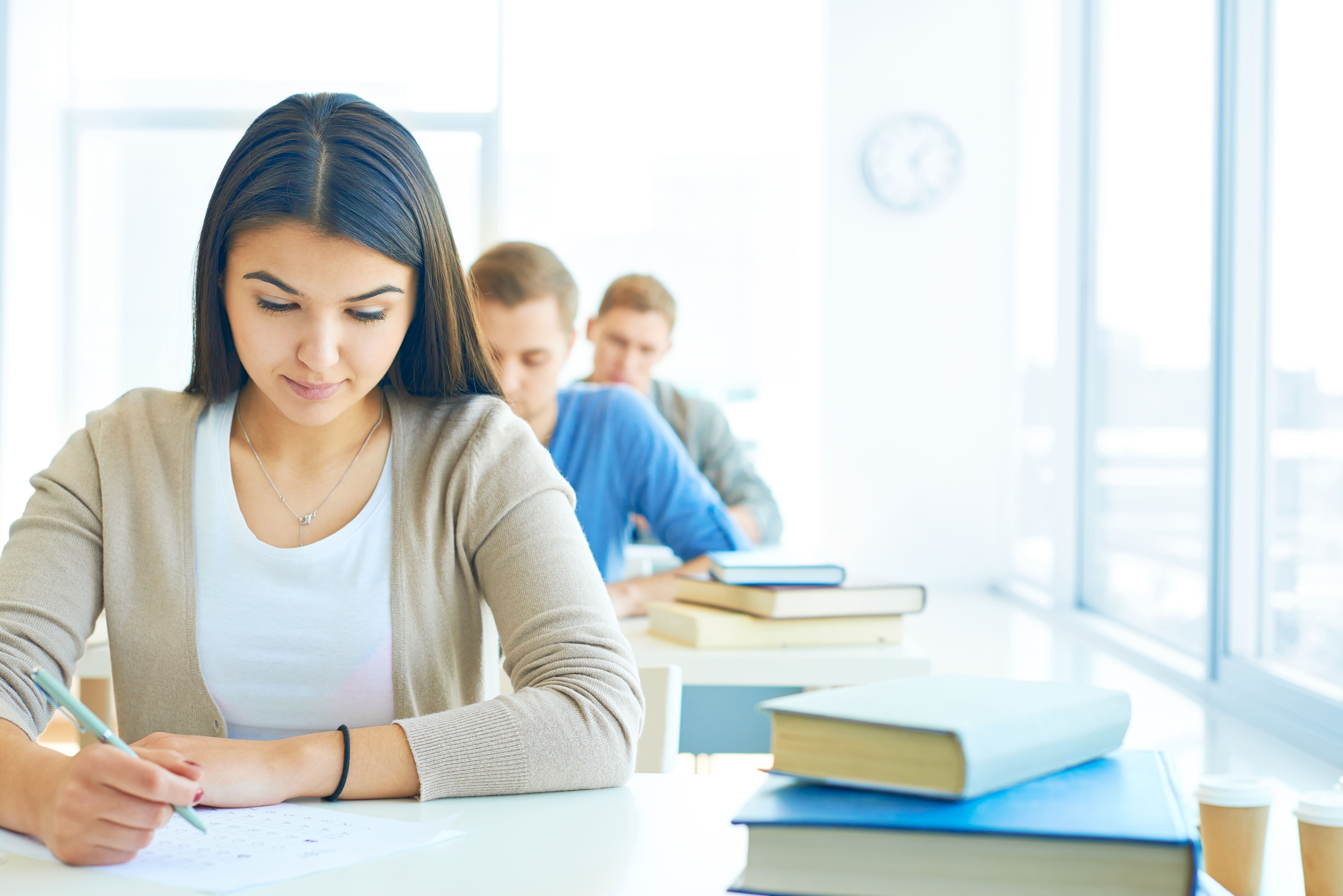 https://www.thesfedu.com/media/2024/03/03row-students-doing-exam-1.jpg