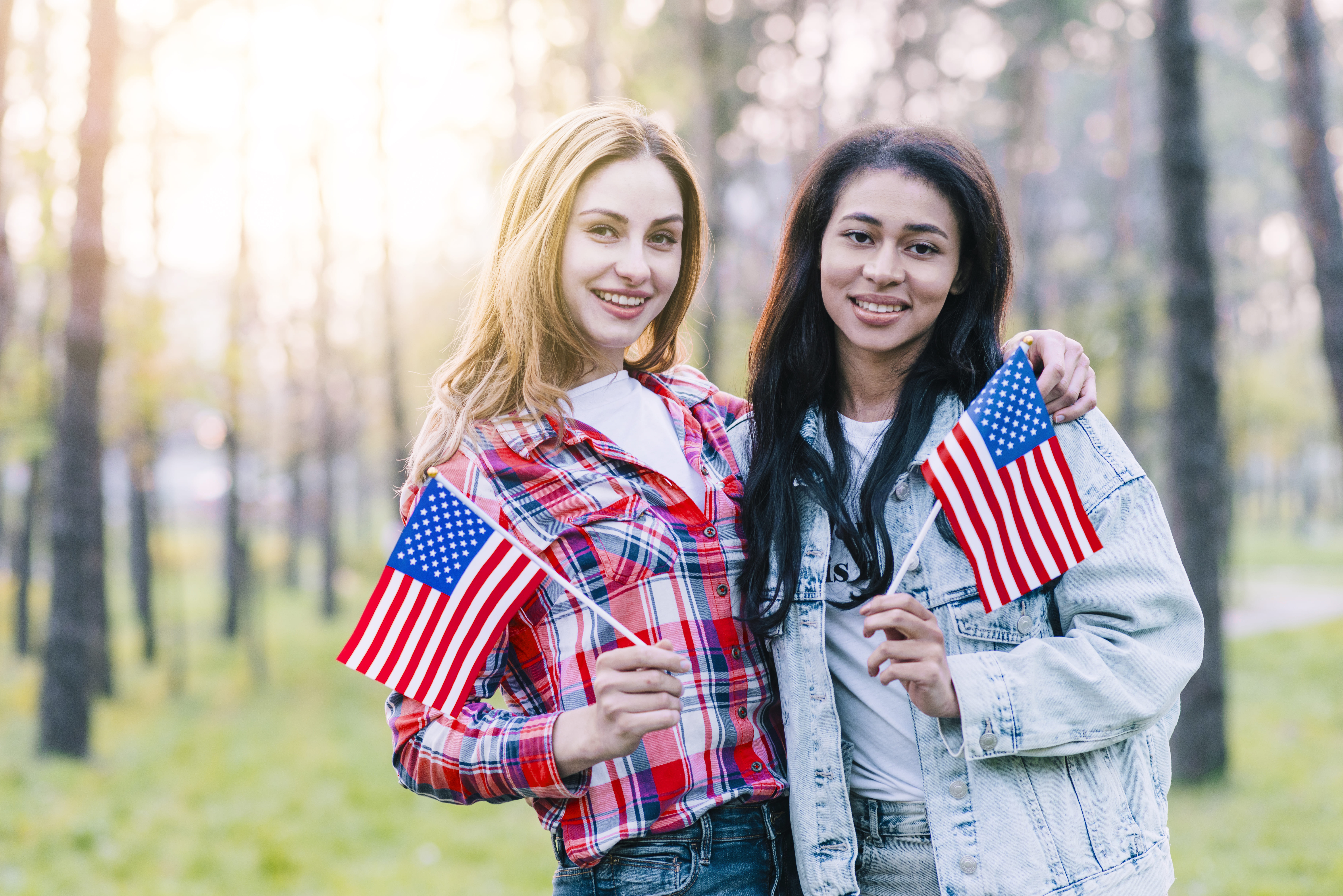 https://www.thesfedu.com/media/2025/02/girlfriends-with-small-american-flags-standing-outdoors-(1).jpg